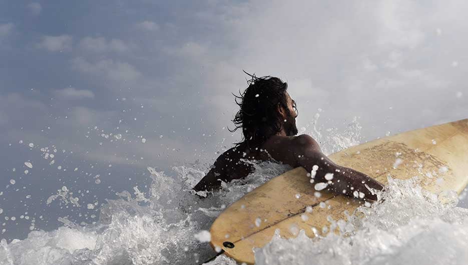 man surfing