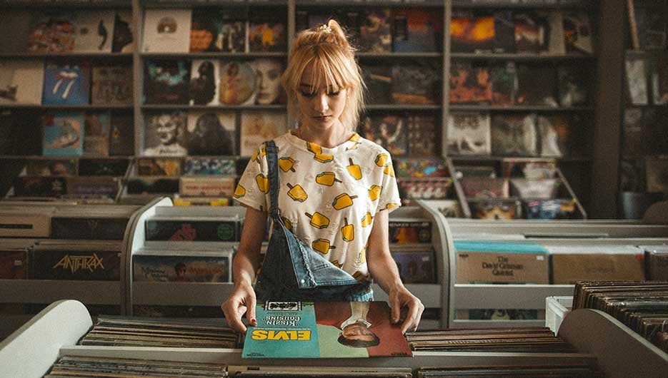 woman holding record